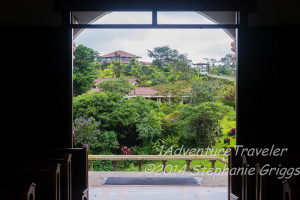 Villa Blanca seen through the church doors.