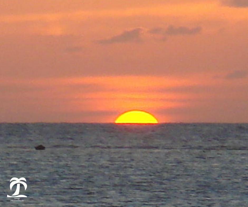 Roatan One of the Bay Islands in the Caribbean, Honduras - 1AdventureTraveler | Journey with me to this lush green island with white sand and beautiful fish in the crystal clear water. | caribbean | scuba diving | snorkeling | travel | scuba | beach | ocean | 